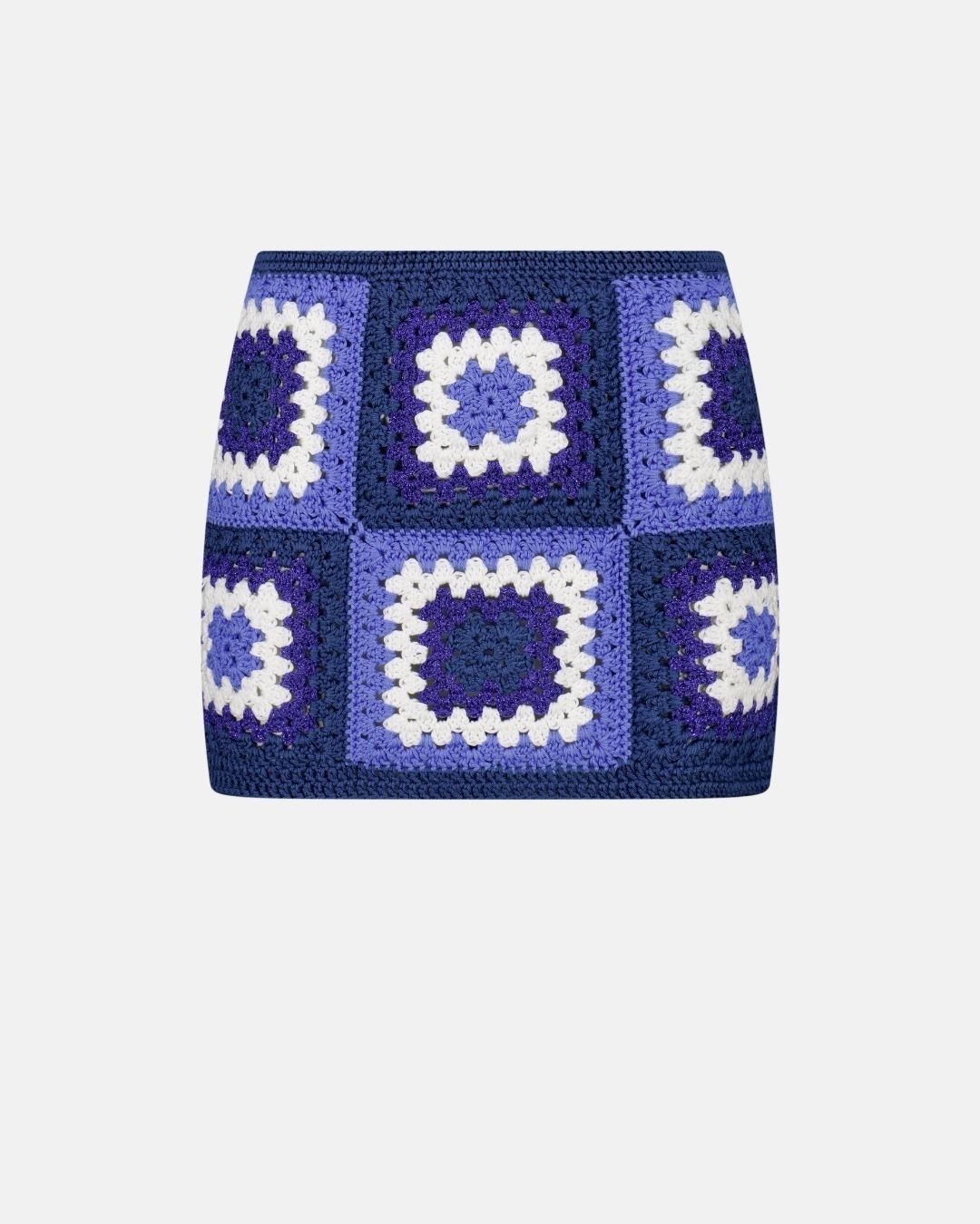 Packshot of the Bianca mini skirt, hand-crocheted with a vibrant blue and white patchwork granny square design.